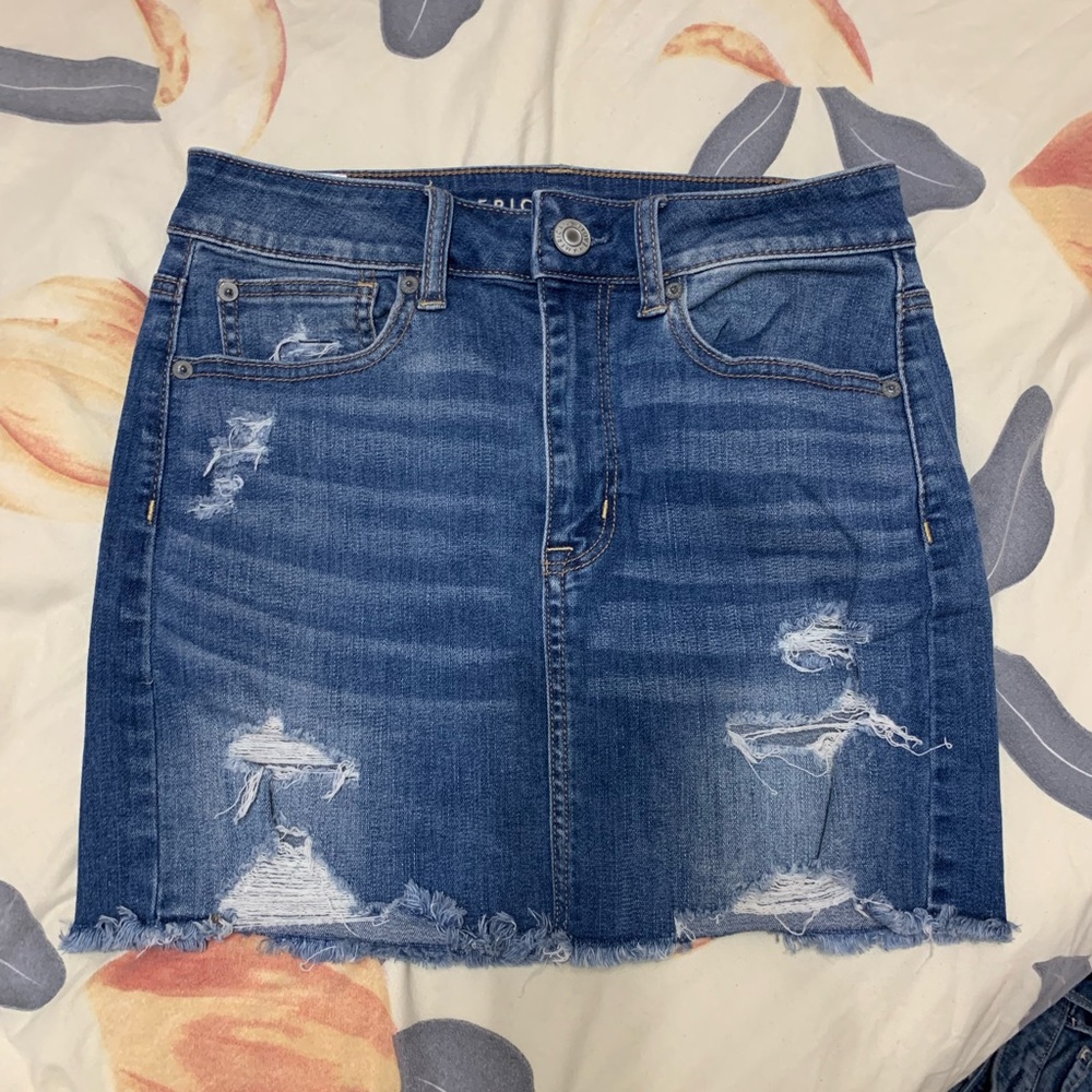 American Eagle stretchy denim blue ripped skirt